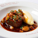 Three Course Dining Experience with Sides and Cocktail for Two at Marco Pierre White's London Steakhouse Co.