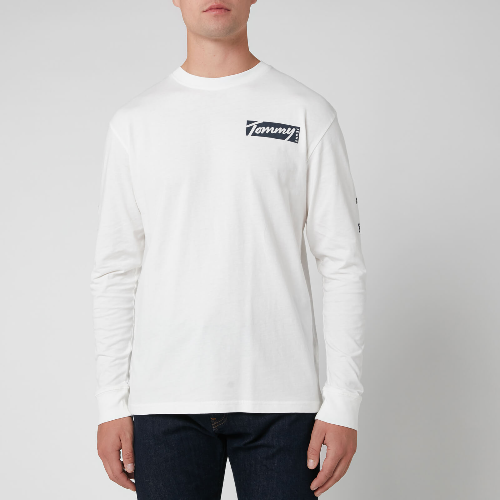 white long sleeves and jeans