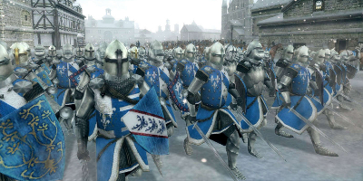 A large force of very smart-looking knights march through a town in the snow