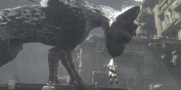 The same dog-like creature, picking up the player's character with it's mouth
