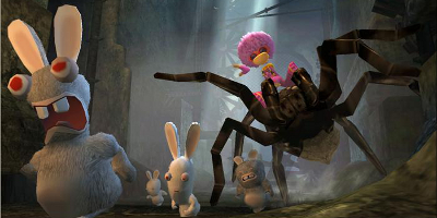 Rayman, chasing some Rabbids on a giant spider
