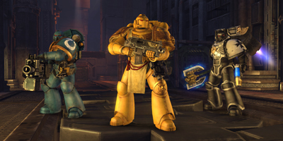 Three Space Marines, stood together, to show the differences in chapters