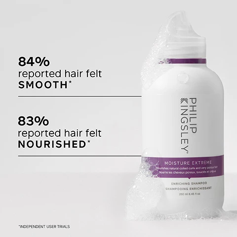 Image 1 - A bottle of Philip Kingsley Moisture Extreme Enriching Shampoo is shown with bubbles on the side, displaying the text 84% reported hair felt SMOOTH* and 83% reported hair felt NOURISHED*.
              Image 2 - A hand holding a bottle of Philip Kingsley Moisture Extreme shampoo, with visible text listing key benefits: Rich, hydrating formula; Cleanses, conditions and detangles; Suitable for natural, relaxed or synthetic hair; Tames even the toughest frizz.
              Image 3 - A woman with curly hair holds a bottle of shampoo and smiles, alongside text that reads The only shampoo my porous dry hair likes. GREAT SLIP... Doesn’t dry out your hair and left my crunchy ends HYDRATED! CUSTOMER REVIEW.
              Image 4 - A white shampoo bottle with a purple label, labeled PHILIP KINGSLEY MOISTURE EXTREME, featuring a description of key ingredients: Sugarcane-derived Quat, Guar, and Sodium C, with corresponding benefits for hair.
              Image 5 - Split image showing a person with curly hair on the left labeled BEFORE with frizz, and on the right labeled AFTER with smoother, well-defined curls.
              Image 6 - A person with curly hair washes their hair with shampoo, while text beside them advises to wet hair and lather well with a gentle kneading of the scalp for 60 seconds and to rinse well.