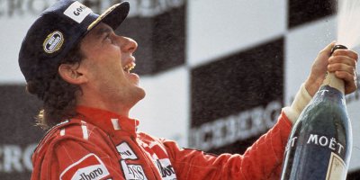 Ayrton Senna Celebrating With A Large Bottle Of Champagne