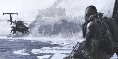 A soldier, watching a helicopter fly past into an icy environment