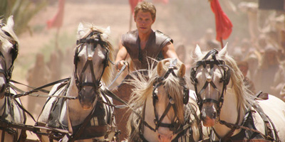 Judah Ben-Hur Played By Joseph Morgan, Riding A Chariot With Four Horses Pulling Him
