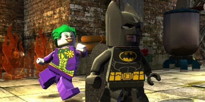 joker running behind batman