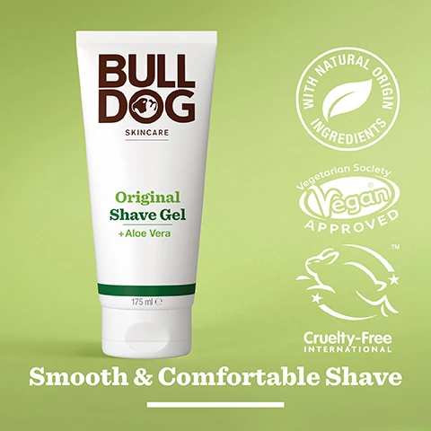 Image 2 - A white tube of Bulldog Skincare Original Shave Gel with green accents, featuring text that reads Original Shave Gel + Aloe Vera, nestled on a light green background, with logos indicating it is vegan approved, cruelty-free, and made with natural origin ingredients, along with the phrase Smooth & Comfortable Shave.
              Image 3 - A close-up image of a green aloe vera leaf with a glistening droplet of water, featuring text that reads 95% Natural Origin, Unlock the true potential of natural origin ingredients, Aloe Vera.
              Image 4 - A person holds a tube of Bulldog Skincare Original Shave Gel in front of a bathroom background, with visible text stating Normal To Dry Skin.
              Image 5 - A tube of Bulldog Original Shave Gel with aloe vera, featuring the text indicating it is made of more than 27% sugarcane and over 62% PCR plastic, sits on a marble surface with a plant in the background and the words Recycled Tube below.