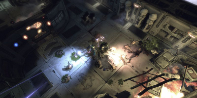 Two players, fending off a swarm of small enemies