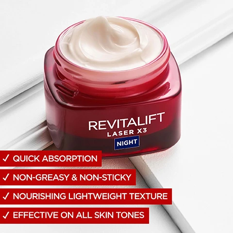 Image 4 - A jar of Revitalift Laser X3 night cream with a smooth, creamy texture sits on a white surface, featuring visible text that includes quick absorption, non-greasy & non-sticky, nourishing lightweight texture, and effective on all skin tones.
              Image 5 - An image featuring three bowls containing different skincare ingredients: a yellow gel labeled Vitamin C with the text “Skin radiance,” a clear gel labeled Hyaluronic Acid with the text “Replump skin,” and a purple gel labeled Pro-Retinol with the text “Smooth wrinkles,” beside a jar of Revitalift Laser X3 Night cream.
