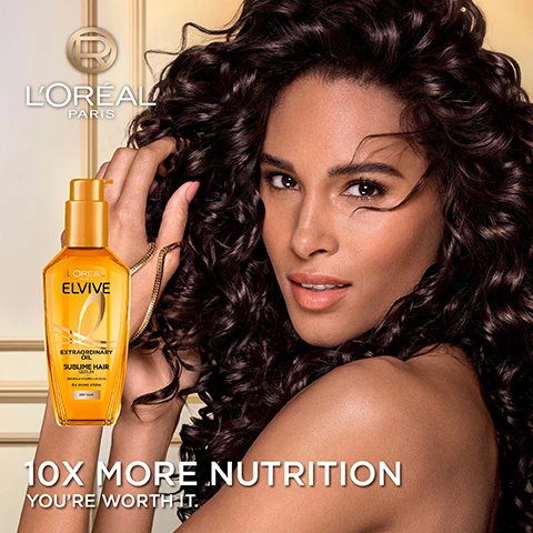 Image 1 - A woman with flowing dark curly hair looks at the viewer, posed with an orange bottle of LOréal Elvive Extraordinary Oil Sublime Hair Serum, with visible text LOréal Paris, LOréal Elvive, Extraordinary Oil Sublime Hair Serum [Marula + Camellia Oils] 6x more shine Dry Hair, 10x More Nutrition, Youre Worth It. Image 2 - A golden bottle of LOréal Elvive Extraordinary Oil Miracle Hair Serum with a pump dispenser is displayed on a beige surface next to text reading MULTI-TASKING HAIR OIL: +92% NOURISHMENT* UP TO 230°c HEAT PROTECTION* UP TO 6X MORE SHINE* UP TO 72H FRAGRANCE** *INSTRUMENTAL TESTS **SENSORY TEST, and the bottle itself shows LORÉAL PARIS ELVIVE EXTRAORDINARY OIL MIRACLE HAIR SERUM [MARULA + CAMELLIA OILS] Up to 6x more shine¹ DRY HAIR. Image 3 - The image shows three split-screen before-and-after comparisons of womens hair, demonstrating transformation from frizzy dark curly hair to defined curls, dry medium brown hair to sleek straight hair, and frizzy dark straight hair to shiny straight hair, with the overlay text TRANSFORMS ALL TYPES OF HAIR and below, REAL RESULTS - NO RETOUCHING *DISCLAIMERS. Image 4 - A golden bottle of LOréal Elvive hair serum with dripping oil on its cap and neck is displayed against a golden background, featuring the text FORMULA WITH [EXTRAORDINARY MARULA & CAMELLIA OILS], LORÉAL PARIS ELVIVE XTRAORDINARY OIL SUBLIME HAIR SERUM [MARULA + CAMELLIA OILS] and a circled R logo. Image 5 - Two LOreal Elvive hair serum bottles, one golden for day and one dark blue for night, are displayed with gold pumps on a white surface with a blue foreground; the image showcases the DAY & NIGHT ROUTINE, with text for the DAY MIRACLE HAIR SERUM reading LONG-LASTING & WEIGHTLESS NOURISHMENT and its bottle label stating LOREAL PARIS ELVIVE EXTRAORDINARY OIL MIRACLE HAIR SERUM [MARULA + CAMELLIA OILS] Up to 6x more shine! DRY HAIR; and text for the NIGHT MIDNIGHT SERUM reading INTENSE OVERNIGHT RE-NOURISHMENT and its bottle label stating LOREAL PARIS ELVIVE EXTRAORDINARY OIL MIDNIGHT SERUM [PRECIOUS CAMELLIA OIL] Intense renourishment in 1 night DRY HAIR.