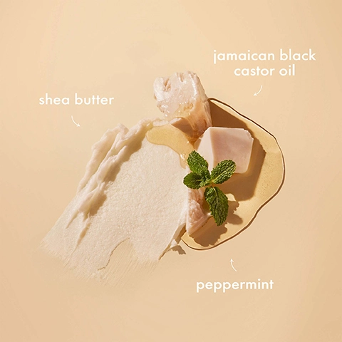 Image 1 - A close-up image featuring shea butter, Jamaican black castor oil, and fresh peppermint leaves arranged on a light beige background with labels for each ingredient.
              Image 2 - A jar of SheaMoisture Jamaican Black Castor Oil Strengthen & Restore Leave-In Conditioner is centered against an orange background, with text indicating it is for chemically processed, heat-styled, or natural hair and highlighting benefits such as softening, detangling, supporting elasticity, and improving the appearance of split ends.