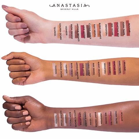 The image features three arms in various skin tones, this shows how each colour looks on each skin type. The colour swatches are on the arms and the shades included are Tempera, Golden Ochre, Vermeer, Bijon Fresco, Antique Bronze, Love Letter, Cyprus Umber, Raw Sienna, Burnt Orange, Venetian Red and Warm Taupe.