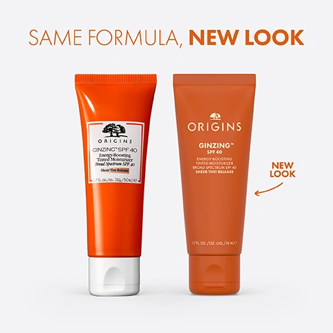 Image 1 - The image shows two tubes of Origins Ginzing SPF 40 Energy-Boosting Tinted Moisturizer, with the older version on the left in a bright orange tube with a white label and white cap, and the newer version on the right in a matte orange tube with direct print and an orange cap, featuring the text SAME FORMULA, NEW LOOK and NEW LOOK. Image 2 - A swatch of light beige, speckled product on an orange background with text that reads: WHAT IT DOES Protects skin from UVA/UVB rays with SPF Perfects with a hint of tint Instantly hydrates & refreshes. Image 3 - A close-up image shows two stacked coffee beans on the left and a cluster of light-colored ginseng roots on the right, with the text FORMULATED WITH Caffeine from Coffee Beans + Panax Ginseng Help boost skins natural energy to revitalize the look of skin. Image 4 - A close-up shows a persons finger dabbing an off-white cream onto their cheek near a blue eye, with the text LOOKS LIKE An off-white cream that transforms into a sheer tinted finish.