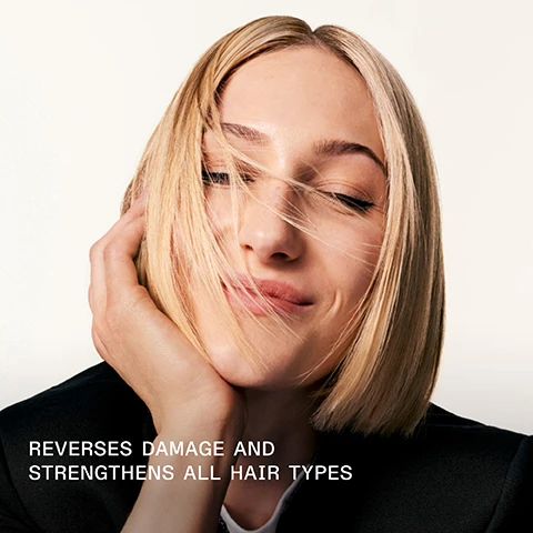 Image 1 - A close-up image of a woman with shoulder-length blonde hair, smiling softly while touching her face, with text at the bottom that reads REVERSES DAMAGE AND STRENGTHENS ALL HAIR TYPES.
              Image 2 - A hand holds a bottle of Olaplex No. 3 hair treatment while a strand of hair is twisted around the bottle; the image features the text: REVERSES HAIR DAMAGE IN AS LITTLE AS 3 MINUTES.
              Image 3 - Image shows a side-by-side comparison of hair labeled BEFORE on the left with frizzy, unkempt texture and AFTER on the right with smooth, shiny waves, with visible text stating UNRETOUCHED IMAGES and product descriptions below.
              Image 4 - A close-up image shows a comparison of hair before and after treatment, with the left side labeled BEFORE displaying frizzy, unkempt hair, and the right side labeled AFTER showing smooth, shiny hair; additional text at the bottom includes details about the results and products used for treatment.
              Image 5 - Split image showing hair before and after treatment, with the left side labeled BEFORE displaying frizzy, dull hair, and the right side labeled AFTER showing smooth, shiny hair, accompanied by text at the bottom stating UNRETOUCHED IMAGES and additional product instructions.
              Image 6 - Image shows three bottles of Olaplex hair care products: the left bottle is labeled Olaplex Hair Perfector No. 3 for strengthening and repairing hair, and the two right bottles are Olaplex No. 4 Bond Maintenance Shampoo and No. 5 Bond Maintenance Conditioner for hydrating, nourishing, and smoothing hair; there is also a heading that reads Add the Every-Wash Essentials.