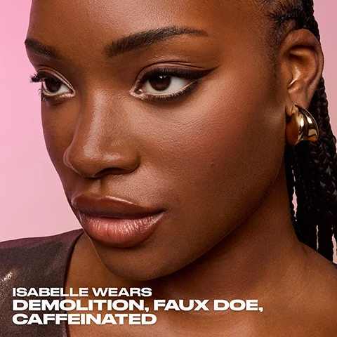 Image 1 - Close-up portrait of a woman with braided hair, wearing bold makeup with a glossy lip, against a pink background, featuring the text Isabelle Wears Demolition, Faux Doe, Caffeinated.
              Image 2 - Close-up of a young woman with long, dark hair and brown eyes, wearing a silver earring and natural makeup, with the text ZOE WEARS COOL COYOTE, TOOTSIE.