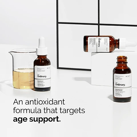 Image 1 - Image shows two brown glass bottles of The Ordinary skincare products next to a clear laboratory beaker containing a yellow liquid, with a white background and black geometric lines, and the text reads An antioxidant formula that targets age support.
              Image 2 - A drop of light-colored serum is suspended from a clear pipette with text on the left stating offers daily skin protection from the impact of oxidative stress and 3% resveratrol 3% ferulic acid.
              Image 3 - A woman with medium skin tone is smiling and gently touching her cheek while applying a skincare product, with the text Apply a few drops to the face in the morning and evening displayed next to her.
              Image 4 - A close-up view of two droplets of a yellow anhydrous serum on a white background, with the text Anhydrous serum texture positioned beside them.
              Image 5 - An image displaying three rows of skincare products: the top row labeled PREP includes cleansers and toners; the middle row labeled TREAT features water-based serums, eye serums, anhydrous solutions highlighted in dark, and oils; the bottom row labeled SEAL shows suspensions, moisturizers, and SPF products.
