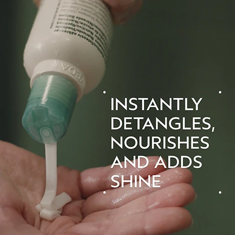 Image 2 - A hand holds a white bottle with a teal cap labeled VEDA, dispensing a stream of white product into the palm, with additional text that reads INSTANTLY DETANGLES, NOURISHES AND ADDS SHINE. Image 3 - The image shows a dark green background with a light blue-green circular area displaying sprigs of purple lavender, white flowers, and yellow-green ylang-ylang flowers with leaves, along with the text POWER YOUR PEACE and A CALMING AROMA WITH A BLEND OF 25 PURE FLOWER AND PLANT ESSENCES INCLUDING LAVENDER, PETITGRAIN, AND YLANG YLANG. Image 4 - A split image shows a before and after comparison of a woman with short, light brown hair with reddish-blonde ends; in the before panel, her hair is straight and flat, labeled BEFORE and Unwashed Hair, while in the after panel, her hair is wavy, voluminous, and shiny, labeled AFTER and Results with Shampure Nurturing Shampoo and Conditioner, Smooth Infusion Style-Prep Smoother, Control Paste and Control Force. Blow dried hair. Image 5 - A creamy white swatch of skincare product with soft shadows on a white background, enclosed within a dark green border. Image 6 - A four-step haircare guide on a dark green background, featuring a person washing their hair, conditioner being dispensed into a hand, a hand holding a spray bottle, and a hand holding a hairspray can, with the visible text: HOW TO USE 01 CLEANSE Shampure™ Nurturing Shampoo 02 CONDITION Shampure™ Nurturing Conditioner 03 PREP Smooth Infusion Style-Prep™ Smoother 04 STYLE Control Paste and Control Force. Image 7 - Three white certification logos are displayed on a backdrop of lush green leaves and a red plant stem, showing 100% VEGAN, Certified B Corporation, and Cruelty Free INTERNATIONAL.