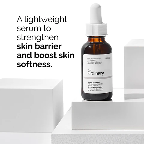 Image 1 - A dark amber glass bottle of serum with a dropper sits on a white surface, accompanied by text that reads a lightweight serum to strengthen skin barrier and boost skin softness, The Ordinary.
              Image 2 - A dropper releasing a clear liquid into a shallow dish, with text that states Betaine provides skin moisturisation and Panthenol has been shown to reduce transepidermal water loss.
              Image 3 - A woman with dark hair is lightly touching her cheek with one hand while looking slightly to the side; text next to her reads Apply a few drops to the face in the morning and evening.
              Image 4 - A droplet of a clear, viscous substance is shown with the text Water-based serum beneath it.
              Image 5 - Three horizontal sections showing skincare products: the top section labeled PREP features cleansers and toners, the middle section labeled TREAT displays various serums and oils with a highlighted water-based serum, and the bottom section labeled SEAL includes suspensions, moisturizers, and SPF, each section illustrated with corresponding product textures.