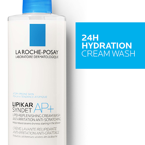 A white bottle of La Roche-Posay Lipikar Syndet AP+ cream wash with a blue cap, featuring product text and a light blue box stating 24H HYDRATION CREAM WASH.