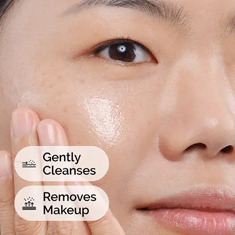 Image 1 - A close-up of a persons face showing the application of a clear skincare product, with text indicating it gently cleanses and removes makeup.
              Image 2 - Image shows three skincare cleanser products from The Ordinary, labeled as follows: Glucoside Foaming Cleanser, Glycolipid Cream Cleanser, and Squalane Cleanser, with descriptions of each products properties and suitability for various skin types.
              Image 3 - A close-up of a skincare product dispensing cream with text that reads Key ingredient: Squalane and Supports the skin barrier for hydrated skin.