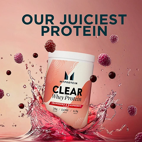 Image 1 - An image of a protein powder container with splashes of liquid and berries, featuring the text OUR JUICIEST PROTEIN and details about the product: CLEAR Whey Protein, Cranberry & Raspberry flavour, 20g Protein, Low Sugar, 4.5g Scaly.
Image 2 - A woman with a ponytail smiles while holding a shaker bottle filled with a pink liquid, wearing a black sports bra, with a building in the background and text displaying benefits of the product: less than 90 KCAL, 20G of protein, and 15+ flavours.