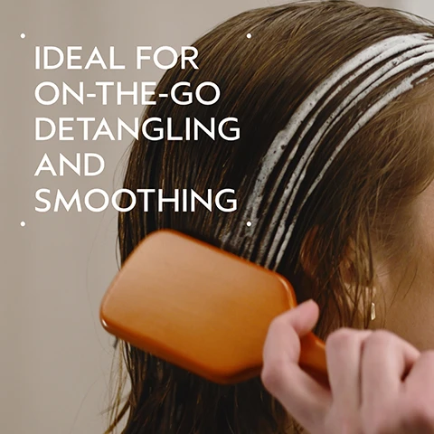 Image 2 - A person brushes wet brown hair with a light brown paddle brush, showing white product applied in stripes, with the text Ideal for on-the-go detangling and smoothing. Image 3 - A split image shows the back of a person with shoulder-length reddish-brown hair; on the left, labeled BEFORE and Unwashed Hair, the hair appears dry and slightly frizzy, and on the right, labeled AFTER and Results with Pure Abundance™ Volumizing Shampoo, Volumizing Clay Conditioner, Style-Prep™, and Volumizing Hair Spray, Phomolient™ Styling Foam. Blow dried with Mini Wooden Paddle Brush, the hair is smooth, shiny, and more voluminous. Image 4 - The image shows a three-step hair care guide with circular photos and text on a dark green background, featuring a woman misting her hair, another woman applying dry shampoo, and powder being dispensed onto a wooden paddle brush, accompanied by the visible text How To Use, 01 Mist Heat Relief™ Thermal Protector & Conditioner Mist, 02 Dry Shampoo Shampowder™ Dry Shampoo, and 03 Brush Mini Wooden Paddle Brush. Image 5 - A split image shows a woman with blonde hair before and after styling; the left panel, labeled BEFORE, shows her with unwashed, flat hair with visible roots and text Unwashed Hair, while the right panel, labeled AFTER, shows her with voluminous, styled hair and text Results with Heat Relief™ Thermal Protector & Conditioner Mist, Shampowder™ Dry Shampoo, and Mini Wooden Paddle Brush. Styled with curling iron. Image 6 - A close-up shot of dark green tropical leaves with three white logos: a 100% VEGAN V symbol, a Certified B Corporation logo, and a Cruelty Free International leaping bunny logo.