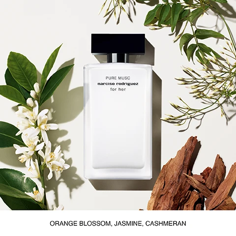 Image 1 - A white perfume bottle with a black cap is surrounded by greenery and white flowers, with the text reading PURE MUSC narciso rodriguez for her above it and ORANGE BLOSSOM, JASMINE, CASHMERAN below.
              Image 2 - Image shows various perfume bottles by Narciso Rodriguez labeled for her, with their names and descriptions beneath each bottle: Eau de Toilette, Eau de Parfum, Pure Musc, Musc Noir, Musc Noir Rose, and Musc Nude, along with scent attributes like Elegant Sophisticated and Sensual Seductive.