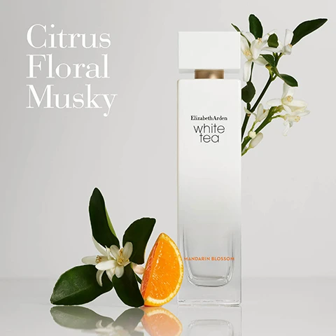 Image 1 - A bottle of Elizabeth Arden white tea perfume is positioned next to an orange slice and green leaves, with a small branch of white flowers, and the words Citrus Floral Musky and Mandarin Blossom are displayed in the upper left corner.
              Image 2 - Three images arranged side by side depict the key notes of a fragrance: a green mandarin fruit on a branch, a light green orchid flower, and a cluster of vanilla orchids with vanilla pods, with the text Key Notes, Top Mandarin, Heart White Tea, Base Luminous Musk.