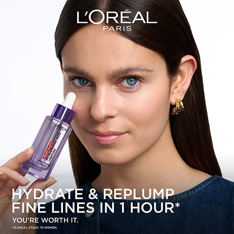 Image 1 - A woman with long dark hair and blue eyes holds a purple LOréal Revitalift serum bottle near her face, looking directly at the viewer, with visible text LORÉAL PARIS, REVITALIFT HYALURONIC ACID + PEPTIDE, HYDRATE & REPLUMP FINE LINES IN 1 HOUR*, YOURE WORTH IT., *CLINICAL STUDY, 75 WOMEN. Image 2 - A LOréal Revitalift Hyaluronic Acid + Peptide Anti-Wrinkle Serum bottle with a dropper is displayed on a purple gradient background, next to the text #N°1 ANTI-AGEING SERUM WORLDWIDE* ✓ REPLUMPS SKIN IN 1 HOUR** ✓ VISIBLY REDUCE LINES IN 1 USE ✓ -47% VISIBLE WRINKLES***, with LOREAL PARIS REVITALIFT HYALURONIC ACID + PEPTIDE Anti-Wrinkle Serum visible on the bottle, and fine print at the bottom stating *BASED ON NIELSENIQ RMS DATA FOR THE FEMALE FACE CARE ANTI-AGING SERUM 15ML TO 60ML CATEGORY (CLIENT-DEFINED) FOR THE 12-MONTH PERIOD ENDING FEBRUARY 2025 FOR THE TOTAL OF 36 COUNTRIES, TOTAL RETAIL MARKET (COPYRIGHT © 2023, NIELSENIQ). **CLINICAL STUDY, 79 WOMEN. ***AVERAGE RESULTS - CLINICAL STUDY WITH 53 WOMEN AFTER 6 WEEKS, VISUAL GRADING., along with a circular R logo. Image 3 - A purple liquid-like sphere with smaller elements, one containing a white plus sign, is displayed on a purple gradient background with text reading: POWERED BY EXCLUSIVE HYALURONIC TECHNOLOGY, 3 TYPES OF HYALURONIC ACIDS, MACRO - MICRO - LONG LASTING, PEPTIDE. Image 4 - Close-up of a person applying a purple LOréal serum to their cheek, with text that reads PROVEN VISIBLE RESULTS, LOREAL HYALURONIC ACID + PEPTIDE REVITALIFT, INSTANT & LASTING PLUMP, and LIGHTWEIGHT & NON-STICKY.
