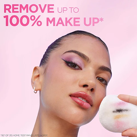 Image 1 - A close-up of a woman with makeup, holding a cotton pad that is slightly stained with makeup, with the text REMOVE UP TO 100% MAKE UP and a note about panelists agreement below.
              Image 2 - A smiling woman with braided hair holds a cotton pad showing colorful makeup remnants, with a pink background and text highlighting NO followed by Rubbing, Residue, and Rinsing.
              Image 3 - Three women with diverse appearances pose in front of a soft pink background, one holding a water bottle, and the text above them reads Formulated for All Skin Types.