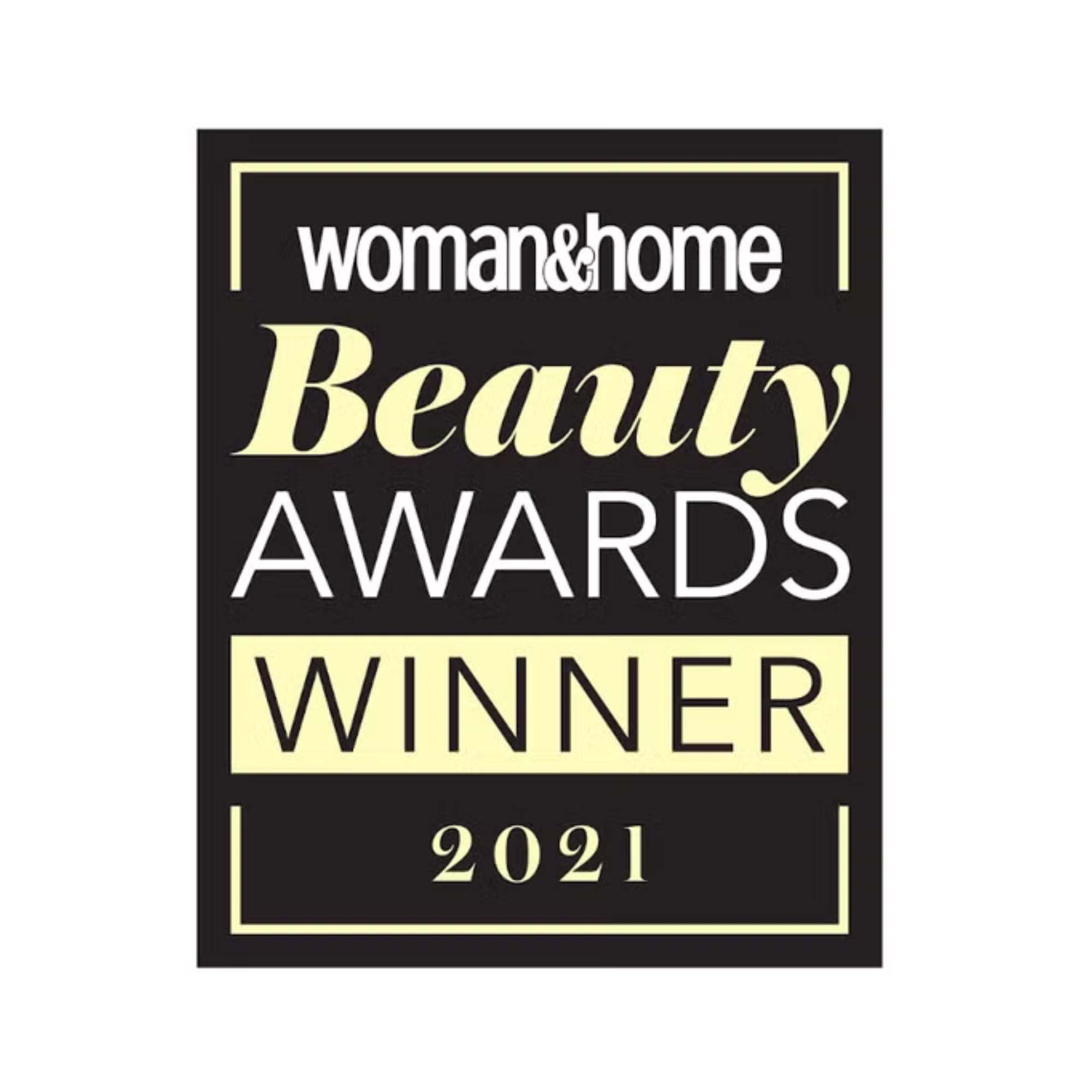 A black rectangular award badge with a light yellow border and text that reads woman&home Beauty AWARDS WINNER 2021.