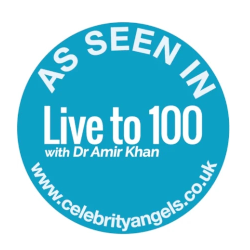 A blue circular badge with white text that reads AS SEEN IN Live to 100 with Dr Amir Khan www.celebrityangels.co.uk.