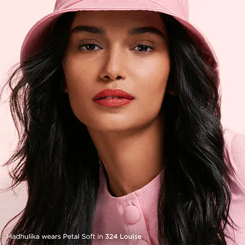 Image 1, a model shot showing the product being worn. Text- Madhulika wears Petal Soft in 324 Louise. Image 2, an image of the product with key ingredients scattered over the background. Text- Raspberry Oil, creates a lipid barrier to give protection and moisture retention. Mango Butter, moisturizes skin and helps to reduce fine lines and wrinkles. Image 3, a shot of a model applying the product. Text- Walda wears Petal Soft in 382 Laura. Image 4, Swatches of the different shades modelled across forearms in three different skin tones. Text- 342 Zoe, 343 Noemie, 341 Simone, 340 Elodie, 324 Louise, 323 Maia, 322 Camille, 320 Amelie, 382 Laura, 381 Chloe, 380 Sienna, 360 Agnes, 361 Alma, 362 Leonie, 363 Adele, 303 Jeanne, 302 Ella, 301 Augustine, 300 Lea