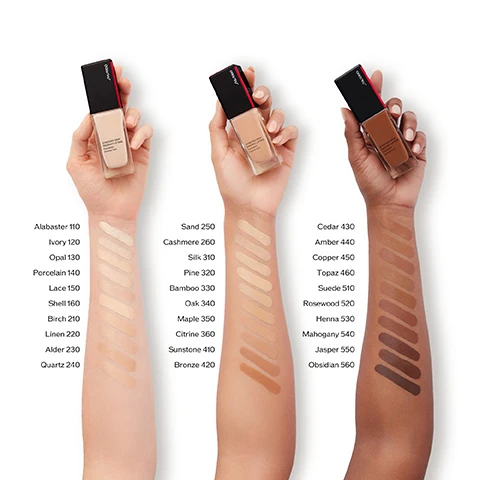 Image 1 - Image shows four arms displaying various shades of foundation in glass bottles, with color swatches labeled alongside; visible text includes foundation shade names and numbers such as Alabaster 110, Sand 250, Cedar 430, and Obsidian 560.
              Image 2 - A split image shows a womans face with the left side labeled BEFORE appearing less even-toned and the right side labeled AFTER showing improved skin tone with a visible product name 320 Pine.
              Image 3 - A row of Shiseido foundation bottles against a warm gradient background, with text displaying SYNCHRO SKIN 24-Hour Wear* Flawless to the Finish. Available in Matte and Radiant Finishes.
              Image 4 - A side-by-side comparison of two Shiseido foundation products, one labeled Synchro Skin Self-Refreshing Foundation SPF 30 Matte with details about climate-adaptive formula and all day hydration, and the other labeled Synchro Skin Radiant Lifting Foundation SPF 30 Radiant with details about lifting and firming bare skin and 24-hour hydration, both featuring a 24-hour wear claim.
              Image 5 - Image of three Shiseido foundation products with their details listed in a table format, including the names Revitalessence Skin Glow Foundation, New Synchro Skin Self-Refreshing Foundation, and New Synchro Skin Radiant Lifting Foundation, along with coverage, wear, finish, and skincare benefits for each product.