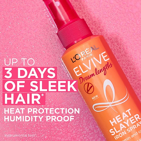 Image 1 - An orange LOréal Paris Elvive Dream Lengths Heat Slayer Iron Spray bottle with a red cap is shown on a pink background covered in water droplets, featuring text that reads UP TO 3 DAYS OF SLEEK HAIR*, HEAT PROTECTION HUMIDITY PROOF, NEW, Instrumental test, and biotin and ca. Image 2 - An orange and pink LOréal Elvive Dream Lengths Heat Slayer Iron Spray bottle is displayed, with text on the bottle reading LOréal Paris ELVIVE Dream lengths HEAT SLAYER IRON SPRAY with vitamin and castor oil LEAVE-IN heat damage shield humidity-proof 3 day sleek LONG, SLEEK HAIR, and accompanying promotional text on the right side stating ELVIVE Dream lengths HEAT SLAYER IRON SPRAY SAVE YOUR SLEEK for up to 3 days straight *Instrumental tests. Image 3 - The image displays four LOréal Elvive Dream Lengths hair styling products—a Super Blowdry Cream tube, an Air Volume Dry Shampoo aerosol can, a Heat Slayer Iron Spray bottle, and a Waves Waterfall Mousse bottle—all arranged on a pink background, with the visible text reading: IN-BETWEEN WASHES STYLE EXTENDERS, LOREAL PARIS ELVIVE Dream lengths NEW SUPER BLOWDRY CREAM with vitamin and castor oil LEAVE-IN nourish lengths & ease blowdry repositionable definition 72h shape memory LONG BLOWDRIED HAIR, LOREAL PARIS ELVIVE Dream lengths COMPRESSED 200ML=300ML 24H SCENTED HAIR NEW AIR VOLUME DRY SHAMPOO with vitamin and castor oil NO WHITE RESIDUE instant root lifting long-lasting clean feel OILY ROOTS FLAT LENGTHS, LOREAL PARIS ELVIVE Dream lengths NEW HEAT SLAYER IRON SPRAY with vitamin and castor oil LEAVE-IN heat damage shield humidity-proof 3 day sleek LONG SLEEK HAIR, LOREAL PARIS ELVIVE Dream lengths 24H SCENTED HAIR NEW WAVES WATERFALL MOUSSE with vitamin and castor oil NON CRUNCHY NON STICKY instant moisture soft and bouncy waves 48h hold and definition LONG WAVY HAIR, STYLE HAIR. MAXIMUM CARE.