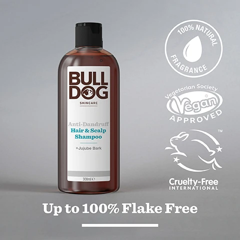 Image 2 - A bottle of Bulldog Anti-Dandruff Hair & Scalp Shampoo with a dark brown liquid, labeled with 100% NATURAL FRAGRANCE, Vegetarian Society Vegan APPROVED, and Cruelty-Free International, along with the text Up to 100% Flake Free.
              Image 3 - Close-up of various pieces of jujube bark on a light background with the text 100% Natural Fragrances and Jujube Bark.
              Image 4 - A hand is holding a bottle of Bull Dog Anti-Dandruff Shampoo, with the bottles label visible, and a drop of shampoo being dispensed onto an open palm; the text at the bottom reads Up to 100% Flake Free.
              Image 5 - A person holds a brown bottle of Bulldog Skincare Anti-Dandruff Hair & Scalp Shampoo, with visible text stating 100% Recycled PCR Plastic Bottle and Recycled Plastic Bottle.
              Image 6 - Two brown bottles of Bulldog skincare products are displayed on a tiled surface; the left bottle is labeled Peppermint & Eucalyptus Shower Gel, and the right bottle is labeled Anti-Dandruff Hair & Scalp Shampoo, and there is text at the bottom that reads Start the Day Right.