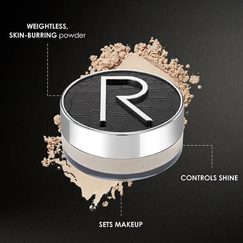 Image of a round container of translucent powder with a black lid featuring the letter R, placed on a dark background with powder scattered around, accompanied by text that says weightless skin-burning powder, controls shine, and sets makeup.