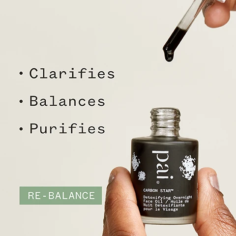 Image 1 - A hand holds a dark glass bottle labeled pai CARBON STAR™ Detoxifying Overnight Face Oil with a dropper dispensing oil above it, next to bullet points reading Clarifies, Balances, Purifies, and a green box stating RE-BALANCE.
              Image 2 - An individual is holding a dropper bottle labeled pai Carbon Star Detoxifying Overnight Face Oil while showing a shoulder with clear skin, accompanied by the text 76% said skin looked clearer* and various certification logos.