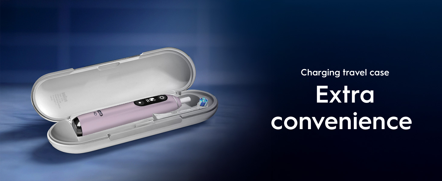 A pink iO9 toothbrush on the left in the charging travel case