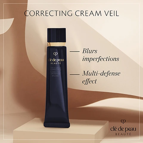 Image 1 - A dark bottle of Clé de Peau Beauté Correcting Cream Veil is displayed on a light, abstract background with text beside it stating Blurs imperfections and Multi-defense effect.
              Image 2 - A woman with long brown hair wearing a black sleeveless top sits outdoors with soft greenery in the background, accompanied by the text Visibly blurs imperfections & roughness to highlight skin contours and clé de peau BEAUTÉ.
              Image 3 - A woman with long dark hair, wearing a black sleeveless top and earrings, is gently holding a black skincare product close to her face, with a soft smile; the text on the image reads: In 2 weeks, skin quality has improved* *Self-assessment results from 99 women, and the logo for Clé de Peau Beauté is visible in the bottom right corner.