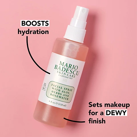 Image 1 - A pink background features a bottle of Mario Badescu facial spray labeled BOOSTS hydration and Sets makeup for a DEWY finish, containing 4 fl oz of product with aloe, herbs, and rosewater.
              Image 2 - An arrangement of pink rose petals and green thyme leaves is displayed, with text describing three extracts: rejuvenating rose canina seed extract, clarifying thyme extract, and mineral-rich + skin-softening bladderwrack (seaweed) extract.