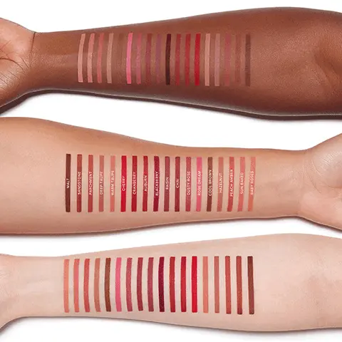 This section includes four different images. The first image includes three arms that display all the shade swatches on offer for this lip liner. On the arm in the middle, each shade is labelled. The shade names are: malt, sandstone, parchment, deep taupe, warm taupe, cherry, cranberry, auburn, blackberry, raisin, chai, dusty rose, rose dream, cool brown, hazelnut, peach amber, sun baked, baby roses. The second image shows you Anastasia Beverly Hills inspired pairings, to show you which lipstick they would recommend pairing with which lip liner. The left hand column shows 18 colour swatches that are all labelled, and on the right hand side there is a column of 18 swatches for a natural sculpt lip liner recommendation, and the second column of 18 swatches is for next level sculpt lip liner options. In the lipstick column, the shade Haze could be paired with baby roses or hazelnut lip liner, lipstick shade tease could be paired with baby roses lip liner or warm taupe, lipstick shade butterscotch could go with hazelnut or cool brown lip liner, praline shade lipstick could go with deep taupe or raising lip liner, taupe beige coloured lipstick could go with dusty rose or deep taupe lip liner, rose brown lipstick looks good with cool brown or sandstone lip liner, lipstick in soft brown could go with parchment or sandstone lip liner, warm peach lipstick could go with warm peach lip liner or sandstone, peach amber lipstick could go with peach amber lip liner or the sandstone, peach bud lipstick could go with sun baked or sandstone lip liner, dusty rose lipstick looks good with dusty rose lip liner or the raisin, rose dream lipstick could be paired with rose dream lip liner or auburn, sugar plum lipstick could be paired with auburn or malt lip liner, blackberry lipstick could be paired with blackberry lip liner of malt, the American doll coloured lipstick could be paired with cherry lip liner or cranberry, royal red lipstick could go with cherry or blackberry lip liner, toffee lipstick could go with cool brown lip liner or the malt and the rum punch lipstick could be paired with the raisin or malt lip liner. The third image displays the four stages of applying lip liner and lip stick for a natural look. They use the lip liner in shade raisin for the outline and the lipstick in shade peach amber to fill in the lips. Step 1: Using a sharpened lip liner, line the top and bottom lip to create the desired shape. PRO TIP: For a rounder, fuller shape on the top lip, apply from the bottom corner and glide towards the Cupid's Bow. Step 2: Using the side of the pencil, softly sculpt and shade from the corners inward for a fuller looking pout, Step 3: Apply Satin Lipstick to the centre of the lips and blend towards the corners. Layer as desired. PRO TIP: Highlight the centre of the lip with magic touch concealer for an ombre effect. Step 4: Finished look, featuring peach amber satin lipstick and raisin lip liner. The fourth and final image shows another four step guide on using lip liner and lipstick to create a bolder look. They use lipstick in shade royal red and the cherry lip liner. Step 1: Using a sharpened lip liner, line the top and bottom lip to create the desired shape. PRO TIP: For a rounder, fuller shape on the top lip, apply from the bottom corner and glide towards the Cupid's Bow. Step 2: Line the top and bottom lip to create desired lip shape. PRO TIP: Line inside the natural lip line on the corner of the bottom lip for a lifted effect. Step 3: Apply Satin Lipstick to the centre of the lips and blend towards the corners. Layer as desired. Step 4: Finished look, featuring Royal Red Matte Lipstick and Cherry Lip Liner
