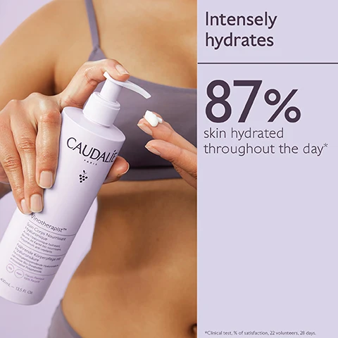 Image 1 - A person is holding a bottle of Caudalie moisturizer and applying a small amount to their hand, with a text section stating Intensely hydrates and 87% skin hydrated throughout the day.
              Image 2 - A white bottle of Caudalie Vinotherapist body cream with a purple background, featuring the text Hyaluronic Acid, Shea Butter, and Polyphenols, along with descriptions of their benefits: Hyaluronic Acid smooths and hydrates the surface of the skin, Shea Butter nourishes, regenerates, and repairs, and Polyphenols are antioxidants.
              Image 3 - Image shows five skincare products arranged on a light purple background, labeled with steps for use: step 1 is Hyaluronic Nourishing Body Lotion, step 2 is Hand & Nail Repairing Cream, and step 3 is Foot Beauty Cream, with a visible white cream swirling on one product.
              Image 4 - Image shows three bottles of Caudalie Vinotherapist Body Lotion with an elegant floral background and instructions on how to recycle, stating How to recycle the Vinotherapist™ Body Lotion, 1. Recycle pump with TerraCycle, and 2. Dispose of bottle in recycling bin.
              Image 5 - A person holding two bottles of Caudalie body lotion, one labeled FULL SIZE 200ml and the other JUMBO SIZE 400ml, against a light purple background.