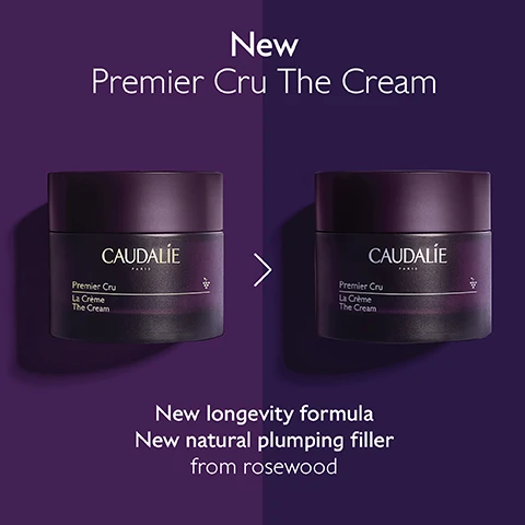 Image 1 - An image showing two similar purple jars of Caudalie Premier Cru The Cream side by side, with the text New Premier Cru The Cream above, an arrow between the jars, and the text New longevity formula New natural plumping filler from rosewood below.
              Image 2 - Before and after images showing a forehead; the left side displays noticeable wrinkles, while the right side shows smooth skin, with text stating Forehead wrinkles reduced by 93% and Unretouched results after using Premier Cru The Cream 2X a day for 2 months.
              Image 3 - Image shows four different creams on a purple background labeled as The Premier Cru Routine, with the text indicating The Serum at the top, followed by The Cream, The Rich Cream, and The Eye Cream below.
              Image 4 - A purple background features a jar of Caudalie Premier Cru cream surrounded by black and green grapes and a dollop of cream, with text highlighting features such as natural plumping filler, longevity patent, and viniferine.
              Image 5 - A hand holds a jar of Caudalie Premier Cru La Crème against a backdrop of green leaves, with text stating Longevity patent, 2x more volume after 1 jar*, and additional small print about the creams effects.
              Image 6 - Image shows two jars of Caudalie skincare products side by side, labeled The Cream on the left with a black jar and The Rich Cream on the right with a dark purple jar, against a backdrop of creamy texture; bulleted text on the left states wrinkles, dark spots, volume, all skin types, and cream texture, while the right lists wrinkles, dark spots, volume, dry skin, and rich texture.
              Image 7 - A woman with long hair is smiling while holding a bunch of dark grapes near her face, with text that reads Targets all signs of ageing followed by checkmarks for Wrinkles, Dark spots, and Volume.
              Image 8 - A person is holding a purple jar of Caudalie Premier Cru La Crème with a silver lid, and text reads: Refillable format -89% less packaging*.
              Image 9 - A person holds a jar of Premier Cru The Cream, with text instructions on how to recycle it: 1 Keep the glass jar and the lid 2 Recycle the empty refill in the recycling bin 3 Insert a new refill into your jar.