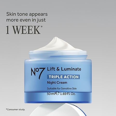 Open light blue jar of white face cream labeled No7 Lift & Luminate Triple Action Night Cream 50 ml.