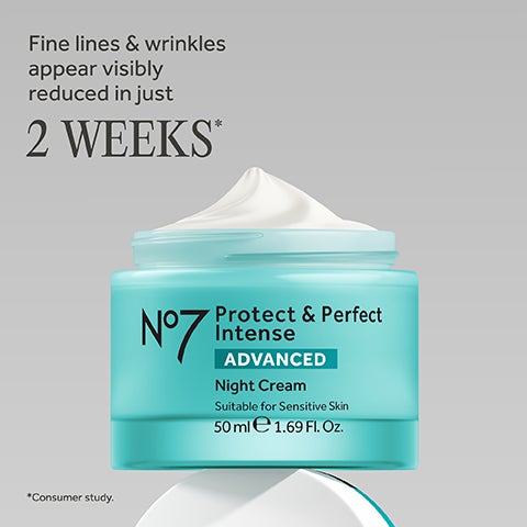 An open teal jar of swirled white cream is labeled No7 Protect & Perfect Intense Advanced Night Cream.