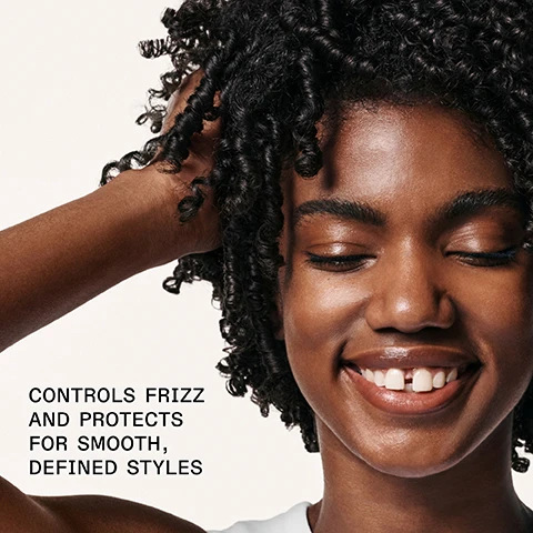 Image 1 - A smiling person with curly hair is touching their hair, and the image includes the text CONTROLS FRIZZ AND PROTECTS FOR SMOOTH, DEFINED STYLES.
              Image 2 - A hand holding a bottle of OLAPLEX No. 6 Bond Smoother with a small amount of cream on the fingers, displaying text that reads 72 Hr FRIZZ CONTROL AND HUMIDITY RESISTANCE and additional product details.
              Image 3 - Image shows a side-by-side comparison of curly hair labeled BEFORE on the left, depicting frizzy hair, and AFTER on the right, showing well-defined curls; visible text at the bottom includes UNTOUCHED IMAGES and additional product information about hair care results.
              Image 4 - Side-by-side comparison of hair labeled BEFORE on the left showing dry, frizzy brown hair and AFTER on the right displaying smooth, well-defined waves with visible text below stating UNRETOUCHED IMAGES and product usage instructions.
              Image 5 - Image shows two OLAPLEX hair care products: a white bottle labeled OLAPLEX No. 6 Bond Smoother and a yellow bottle labeled OLAPLEX No. 7 Bonding Oil, with text that reads Add OLAPLEX No. 7 for Frizz Control and Shine, Smooth Frizz + Hydrate, and Boost Shine + Softness.