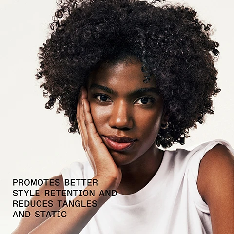 Image 1 - A woman with curly hair rests her hand on her face, looking directly at the camera with a slight smile, with text below her stating PROMOTES BETTER STYLE RETENTION AND REDUCES TANGLES AND STATIC.
              Image 2 - A bottle of Olaplex No. 9 Bond Protector Nourishing Hair Serum with text stating 48 Hr POLLUTION PROTECTION and additional details about its antioxidant-rich formula for all hair types.
              Image 3 - Image showing two side-by-side views of hair: the left side labeled BEFORE displays dry, frizzy hair, while the right side labeled AFTER shows well-defined, tight curls; at the bottom, text reads UNTREATED IMAGES followed by *Results may vary. Results achieved by cleansing with N°4 Bond Maintenance® Shampoo, conditioning with N°5 Bond Maintenance® Conditioner, and applying N°9 Bond Protector Nourishing Hair Serum to damp hair before styling.
              Image 4 - Image comparison showing two sections of hair labeled BEFORE on the left with frizzy, textured hair and AFTER on the right with smooth, shiny hair, with visible text underneath that reads UNTOUCHED IMAGES* *Results may vary. Results achieved by cleansing with Nº4 Bond Maintenance® Shampoo, conditioning with Nº5 Bond Maintenance® Conditioner, and applying Nº9 Bond Protector Nourishing Hair Serum to damp hair before styling.
              Image 5 - Image shows two OLAPLEX hair care products: a white bottle labeled Olaplex No. 9 Bond Protector Nourishing Hair Serum and a yellow bottle labeled Olaplex No. 7 Bonding Oil, with text that says Add OLAPLEX N°7 For Even More Shine, Multi-Benefit Styling Serum, and Boost Shine + Softness.