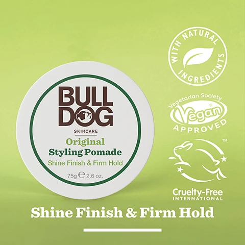 Image 2 - A round container of Bulldog Skincare Original Styling Pomade with a green and white design, featuring the text BULLDOG SKINCARE Original Styling Pomade Shine Finish & Firm Hold 75g 2.6 oz and icons for natural ingredients, vegan approval, and cruelty-free certification.
              Image 3 - A close-up image of a droplet of argan oil resting on a green surface with the text Argan Oil, Responsibly Sourced Argan Oil, Shine Finish & Firm Hold.
              Image 4 - A young man with short, dark hair and glasses smiles against a green background, with text that reads All Hair Types.
              Image 5 - A round jar of Bulldog Original Styling Pomade with a light green background, featuring text that reads Bulldog Skincare, Original Styling Pomade, Shine Finish & Firm Hold, With Argan Oil, 75g, 2.6 oz, and an icon indicating 99.8% Recycled PCR Plastic Jar.
              Image 6 - Four Bulldog Skincare hair styling products are arranged on a light green background, including a pomade, cream, salt spray, and clay, with the text Seriously Good Hair Styling below.